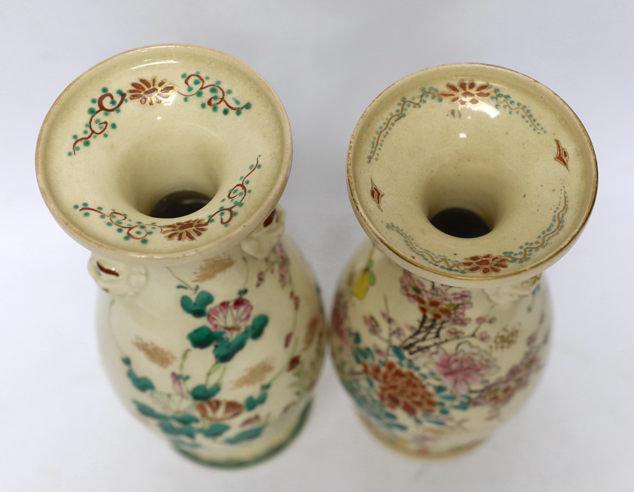 Two Meiji Satsuma floral baluster vases, 23cm high